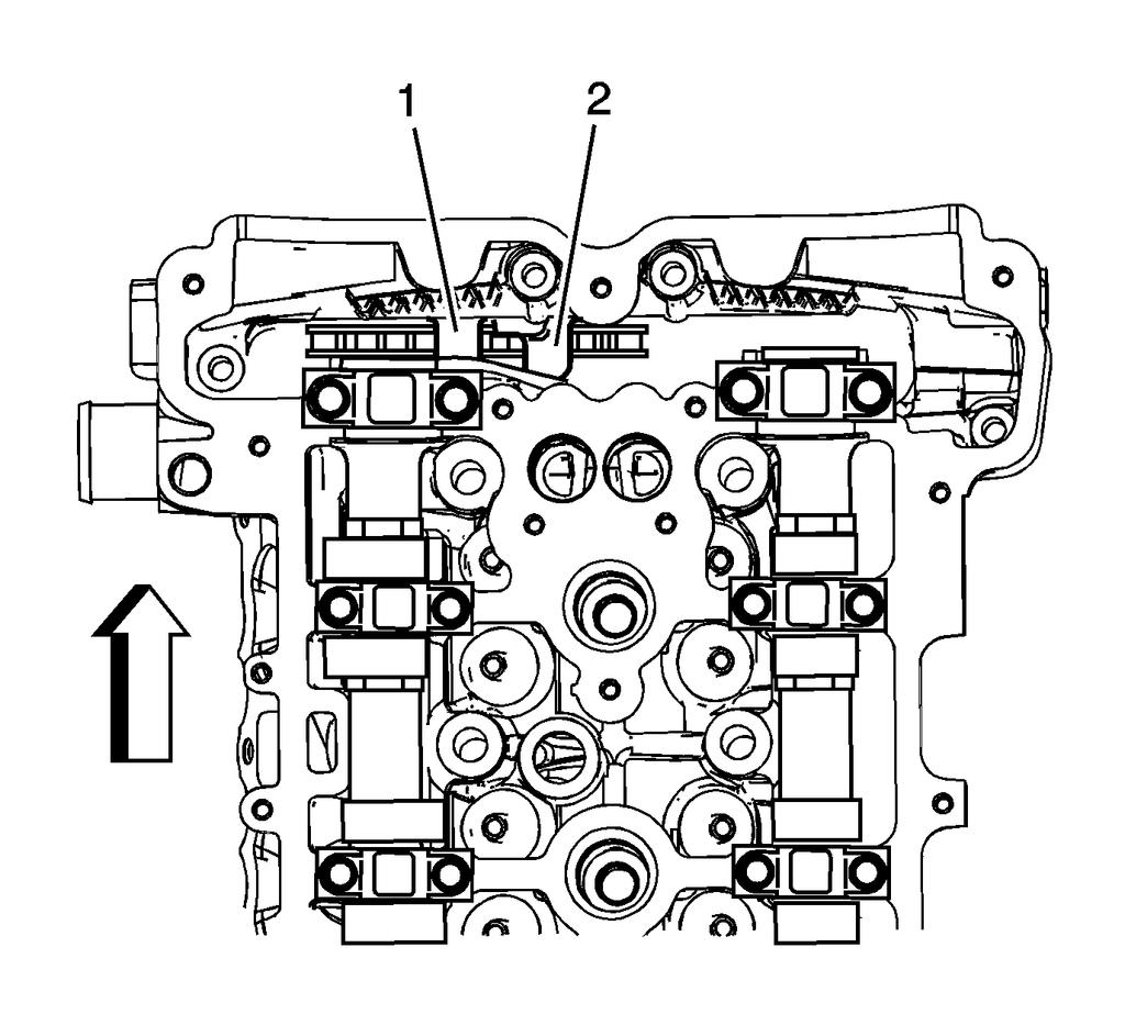 7. Lower the timing chain through the opening in the cylinder head. Use care to ensure that the chain goes around both sides of the cylinder block bosses (1, 2). 8.
