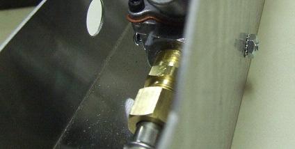 The large hole on the front may be used to insert the bolt into position.