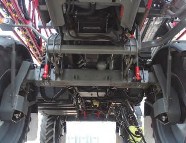 The under-chassis crop clearance is 1.45m and the track width can be fixed at 3 to 3.5m. Mudguards and mud flaps are standard and follow the wheel when steering or adjusting the track.