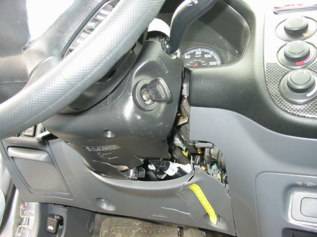 Furthermore, the left side of the steering wheel rim was bent toward Figure 12: Close-up of contact damage to underneath surface of case vehicle s steering column and right side of driver s knee