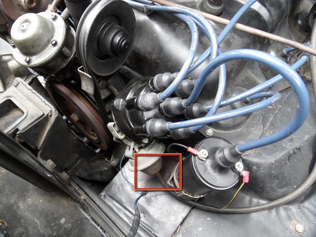engine Remove the vacuum advance hose from the carburetor and