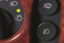 Activate the fog lamps Press the button (see A below) located on the instrument panel to the right of the exterior lamps switch once.