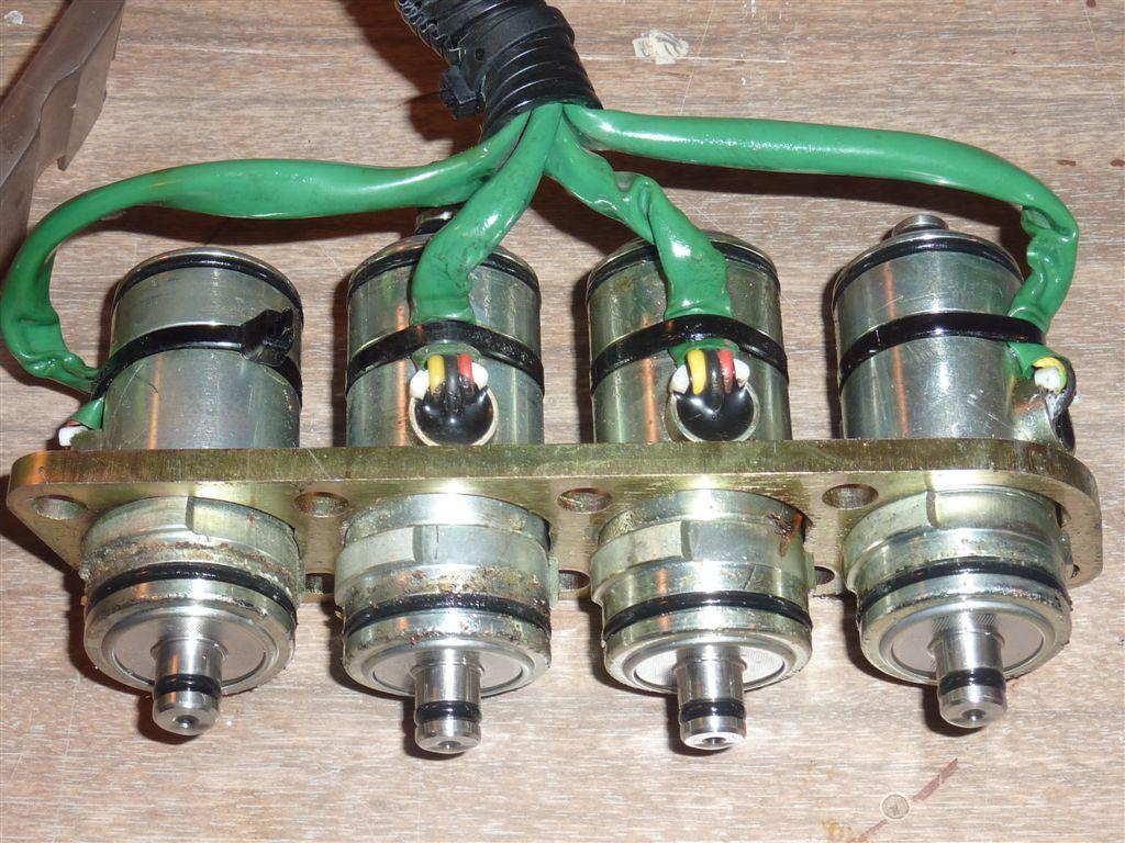 Continuing to work on the solenoid side, you will notice that there are eight 6mm hex head bolts. These are extremely tight. Remove them all. I recommend a 6mm hex socket.