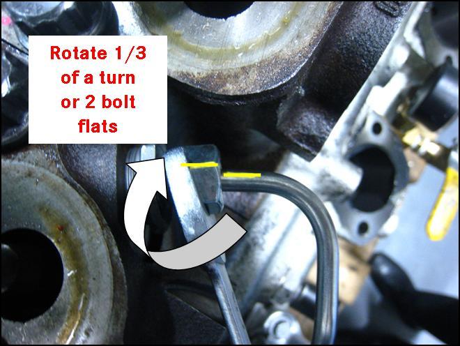 7. Using 24mm fuel line wrench (J-45063 or J-47484), hold the transfer tube thrust nut.