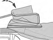 Raise the front of the deck and collapse the rear bows, tucking the two plastic strips above the door openings and the stay pad on the rear bow