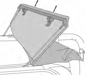 Close lever over top of hook Header Latch Windshield Frame Catch hook in slot Windshield Header Installation Release the header latches and fold the Windshield Header back to reveal the front holes