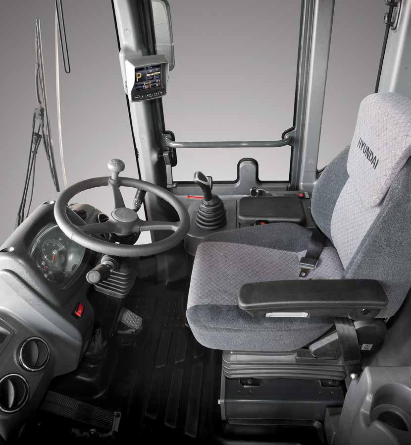 In the 9S series cabin you can easily adjust the steering column and wrist rest to best suit your Operator Comfort preferred comfort level.