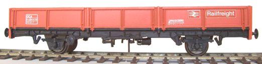 The kits have pivotting wheel/axleguard units which are turned by the couplings, and returned to a straight position by a spring (the open/timber wagons below also have