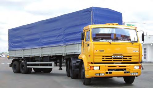 Combination vehicle: KAMAZ-5490 tractor unit with a drop-side