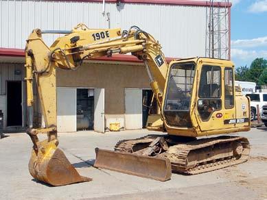 hydraulic quick coupler, Cat 48 digging bucket, vandal kit, heat and air conditioning, 15 10 crawlers, and 31.