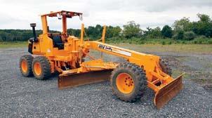 transmission, equipped with 84 smooth drum, drum drive, 2-frequency vibration, ROPS canopy, and 18x26 tires.