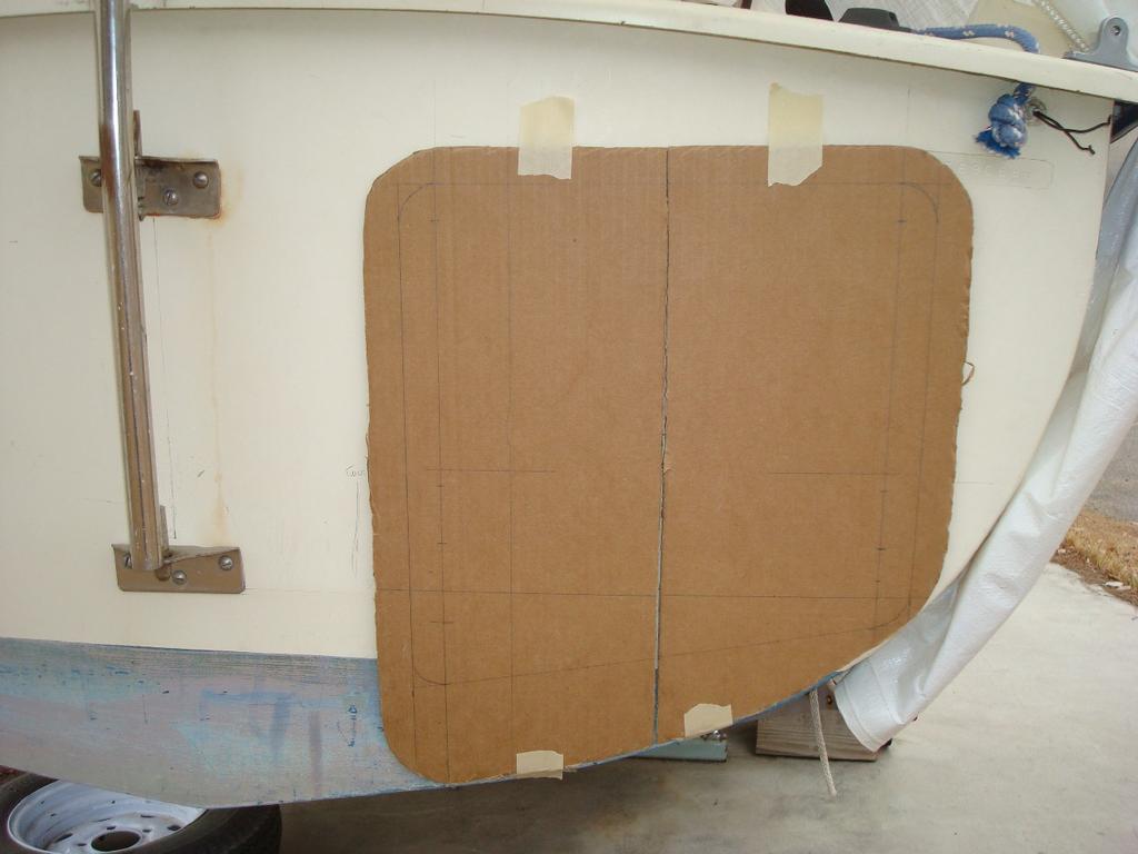 To get the cardboard to the inside surface of the transom, I found I had to cut it into two pieces. In addition, the upper part of the transom already had some thickness to it.