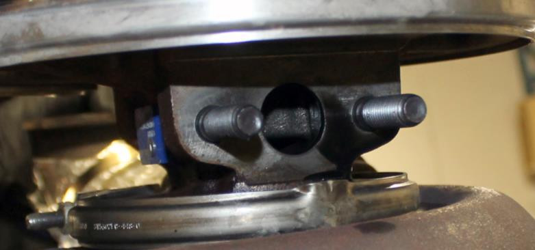 Mount the turbo onto manifold, fasten with the mounting nuts provided (14mm wrench). 11.
