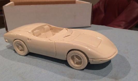 According to the ad, this is a 1/24 scale resin model of the Corvair Monza SS concept car based