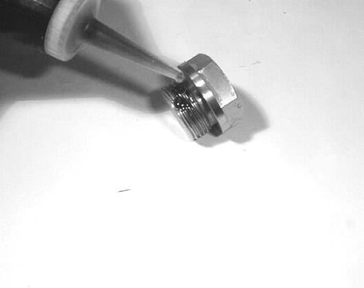 Next, use a 5mm allen wrench to remove the 8 socket head cap screws (34). 8. Check surfaces of plunger (16).
