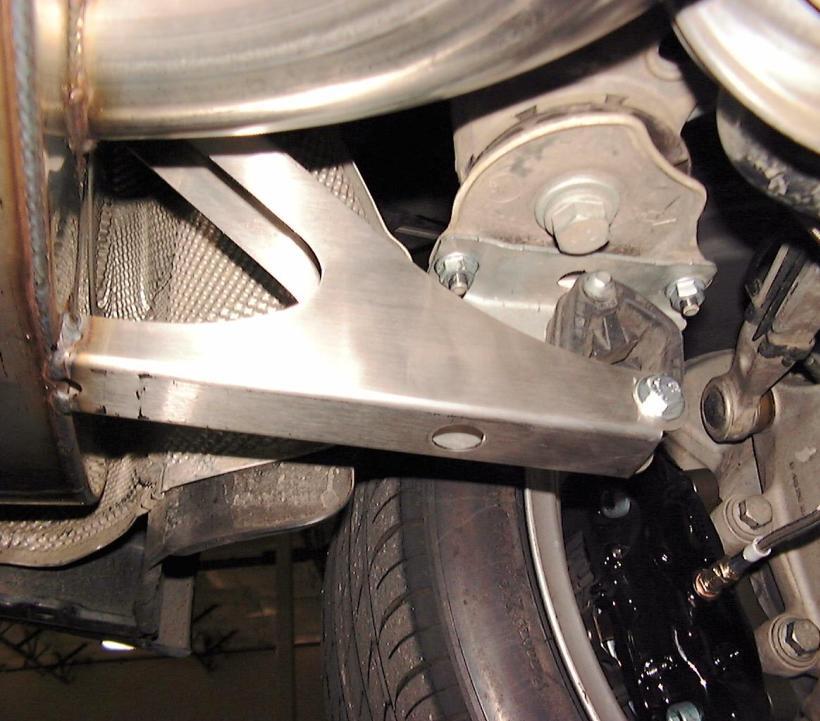 See figures 10. 11. Rotate clamps so that you have at least ½ clearance around the bolt. Remember that the exhaust grows in length as it gets hot.