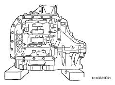 Fig. 416: Identifying No. 1 Transaxle Case Plug 42. INSPECT INPUT SHAFT END PLAY (See INSPECTION ) 43. FIX AUTOMATIC TRANSAXLE ASSEMBLY Fig. 417: Identifying Transaxle On Wooden Blocks 44.