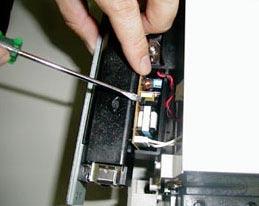 Use a flat screwdriver to remove the inverter board. 4.