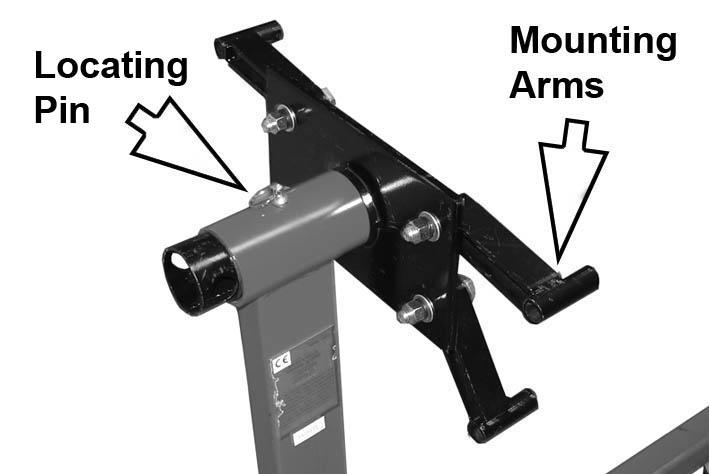Fit the mounting plate to the upright column and secure with the locating pin. 6. Attach the four mounting arms to the mounting plate with nuts, bolts and washers. 7.