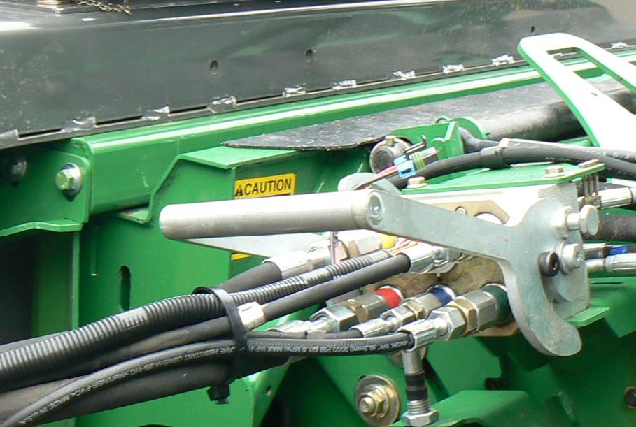 For John Deere 60 Series 1. Route Y201 up to the new JD single point adapter and install into the adapter with the C clip removed earlier. 2.