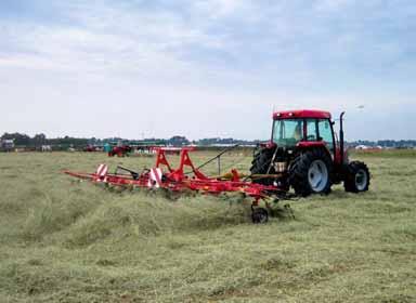 20 21 HAY TEDDERS WITH TRANSPORT CHASSIS TH 800 TRANS Attachment via tractor linkage drawbar or hitch NARROW ON THE ROAD WIDE OUT IN THE FIELD On the TH 800, the machine is attached via a tractor