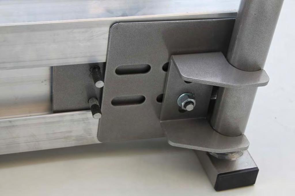 Steel attachment clamps slide into the extruded