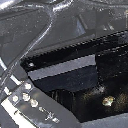 10. Installing Underseat NDAX. Take the 1 x 1 NDAX (1) and place it on the seat mount. Start at the back and work your way forward until you reach the left tank mount (2). See Figure 6.