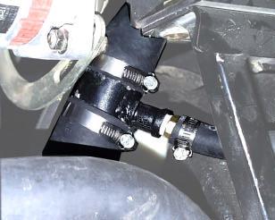 lower radiator hose is connected to the water pump inlet. Route the 5/8"ID heater hose to the lower radiator hose.