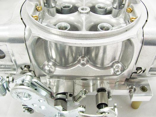 If the carburetor does hang up, check for bent or improperly installed studs. Replace the studs if necessary.