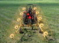 Highly flexible, tightly spaced tines (40 per wheel) gently sweep the crop toward the center at operating speeds up to 14 mph.