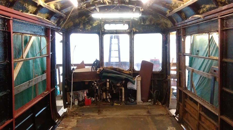Inside the First Class Saloon, all old paint has been needle-gunned from the inside and all rotten areas of framework and panelling removed.