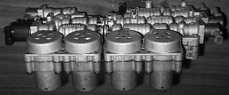 Accumulator Chambers: The accumulator chambers are similar in function to "fluid dampers".