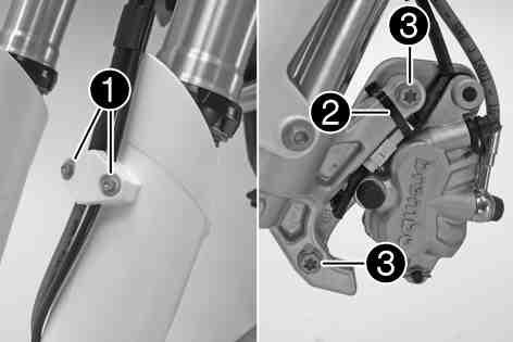 Push the fork protector downwards. 101321-10 10.6Positioning the fork protection 10.7Removing the fork legs 101321-11 Position the fork protection on the left fork leg. Mount and tighten screws.