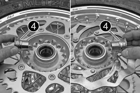 Make sure when pushing back the brake piston that you do not press the brake caliper against the spokes. Remove chain adjuster.