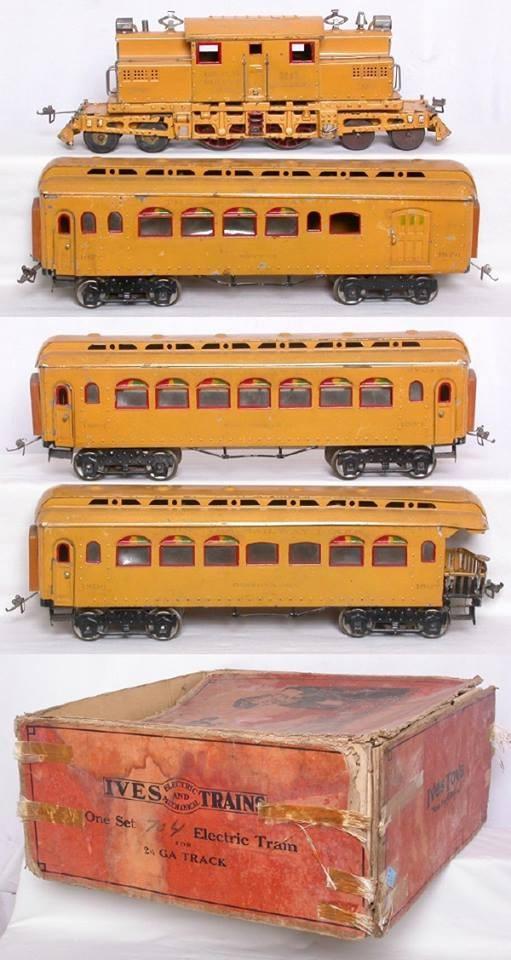 Fantastic 704 Set with Rare Orange Unique Orange Frame Disk Pilot Wheels Square Reverse Opening -1 Next to the Number 1-Gauge Couplers (As seen and reprinted from the Facebook group Tinplate Toy