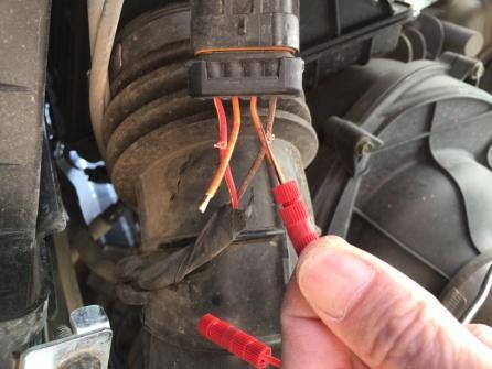 The black rear turn signal wire connects to the orange wire with the black stripe.