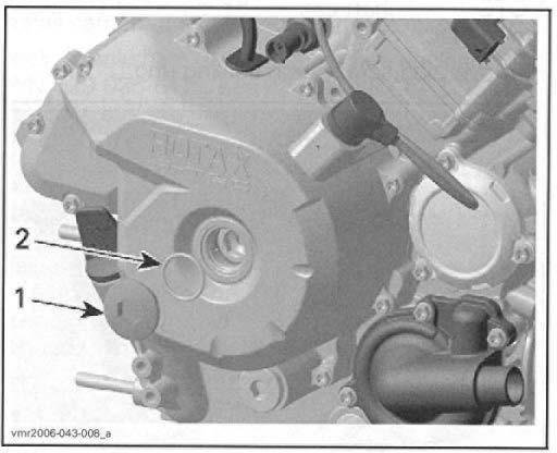 NOTE: Before installing the camshaft screw adjust the chain tension (see CHAIN TENSIONER below) and check again if marks on the timing gear are parallel to cylinder head base.