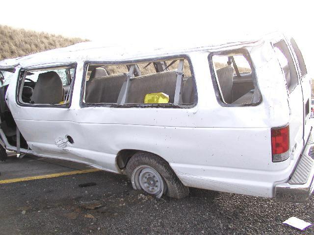 VEHICLE DAMAGE Exterior Damage - 2003 Ford Econoline E350 van Damage Description: CDC: Moderate roof and side damage consistent with a rollover crash.