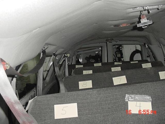Interior Damage - 2003 Ford Econoline E350 van Interior showed large quantities of blood, concentrated primarily on the interior right passenger door.