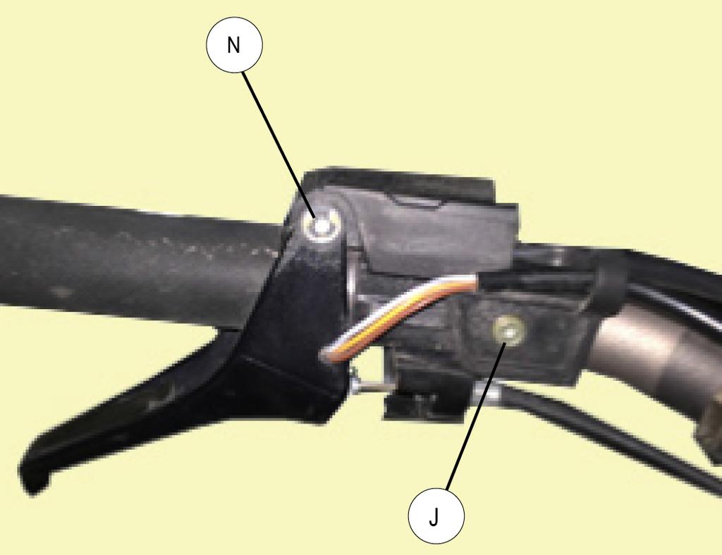18. Reassemble throttle by placing throttle block back onto handlebars and reinserting C-clip (N) for bottom of throttle bolt (J) with a flathead screwdriver.