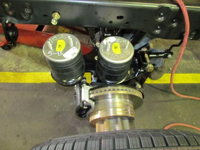 Once all the bolts are started, go back and tighten the 3/4x9 1/2 bolts to 175 ft./lbs., the 5/8 bolts to 150 ft./lbs. and the 9/16 to 125 ft./lbs. 9/16x2 1/2 bolt Passenger side shown in picture 10.