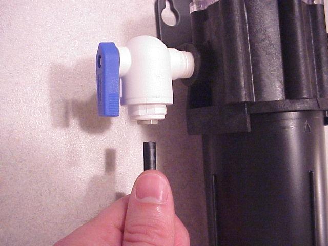 Note: Depending on the installation, the tubing that is attached to the faucet assembly may reach the outlet elbow of the filter