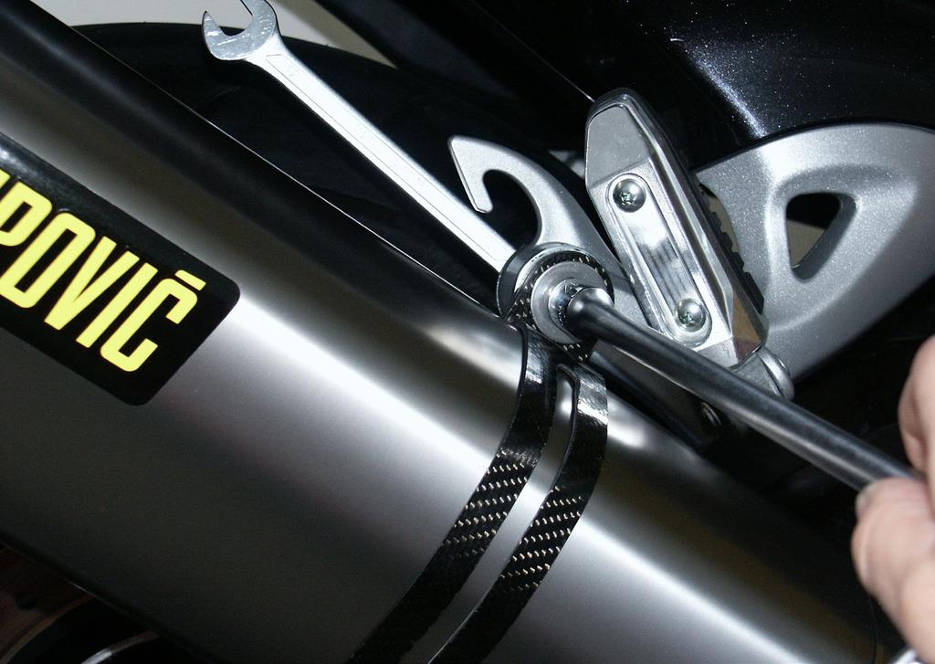 8. Tighten the bolts on the carbon-fiber clamp/stock muffler bracket