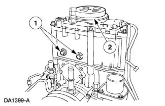 Page 10 of 16 43. Remove the cylinder heads. 1. Position the special tool. 2. Install the four bolts. 3. Attach the special tool and remove the cylinder head. 44. Remove the oil cooler. 2. Remove the oil cooler and the gaskets.