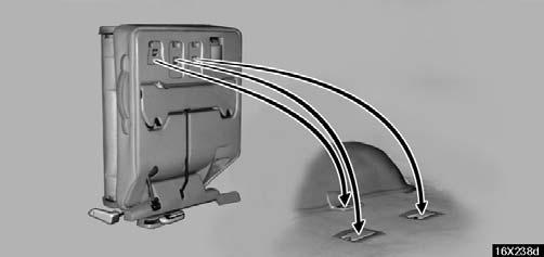 Remove the seat hook covers from the back of the seat cushion and install them onto the seat anchor brackets.