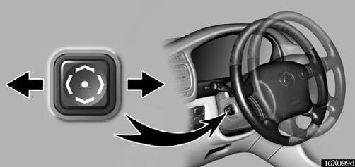 COMFORT ADJUSTMENT Adjustment of telescopic steering column Auto tilt away* 16X099d 16X100d To adjust the steering column length, push the control switch forward or backward to set