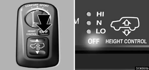 STARTING AND DRIVING Selecting the high mode: Push the height select switch on the side when the vehicle speed is under about 30 km/h (19 mph). To change the normal mode to high, push the switch once.