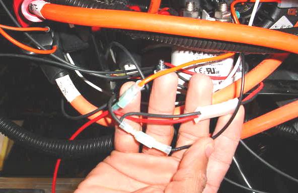 Now, connect the red/black 2-wire harness provided in the kit to the short mating harness of the contactor.