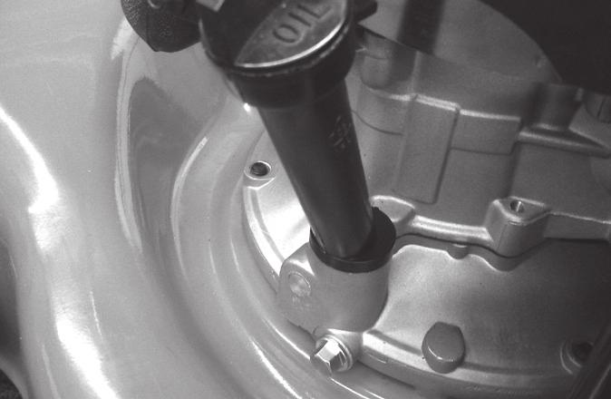 spillages. Refill with SAE30 oil. When the dipstick is rested on the filler pipe, the oil level must be between the min and max marks on the dipstick. See Filling with Engine Oil. Do not overfill.