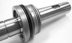shaft. Align the seal lip to enter the center diameter of the seal spacer and push until seal body touches seal spacer.